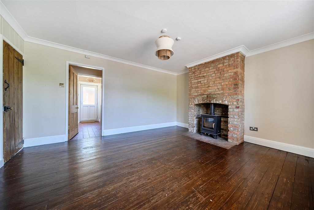Property photo 2 of 12 Living Room With Log Burner