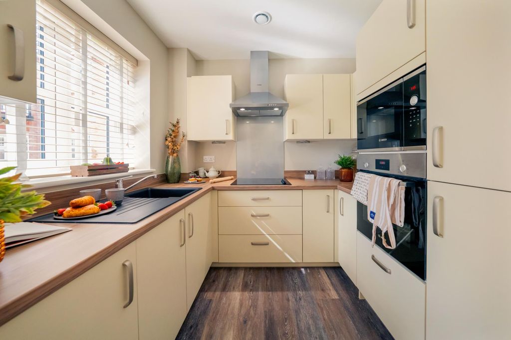 Property photo 2 of 10 Typical Kitchen