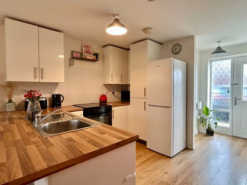 Property photo 3 of 12 Kitchen Area