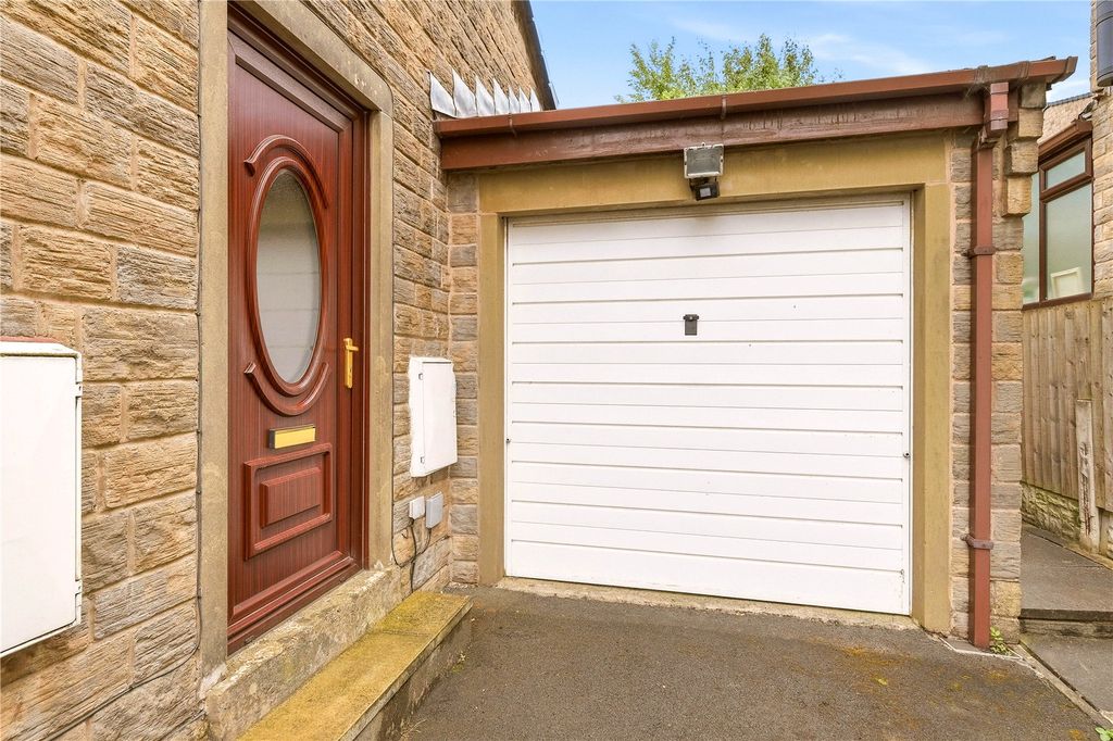 Property photo 2 of 19 Front Door & Garage
