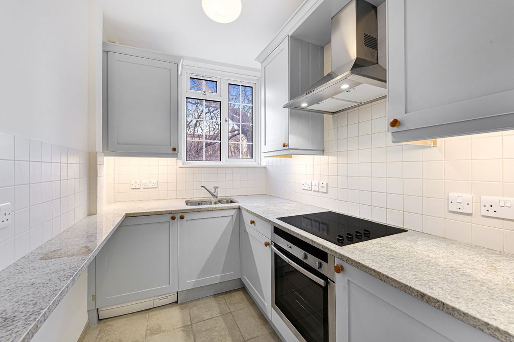 Property photo 3 of 12 Kitchen