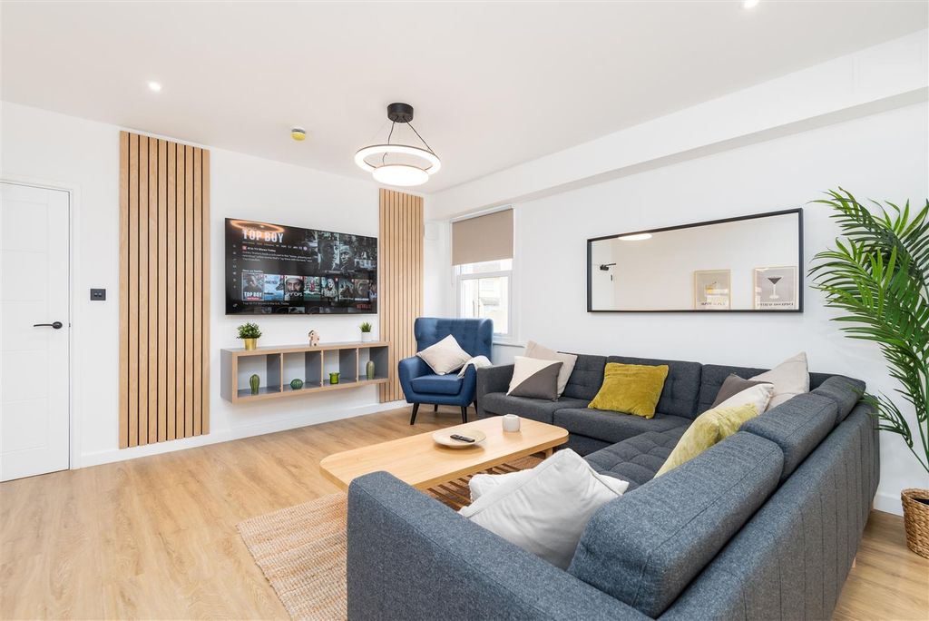 Property photo 2 of 16 Living Area