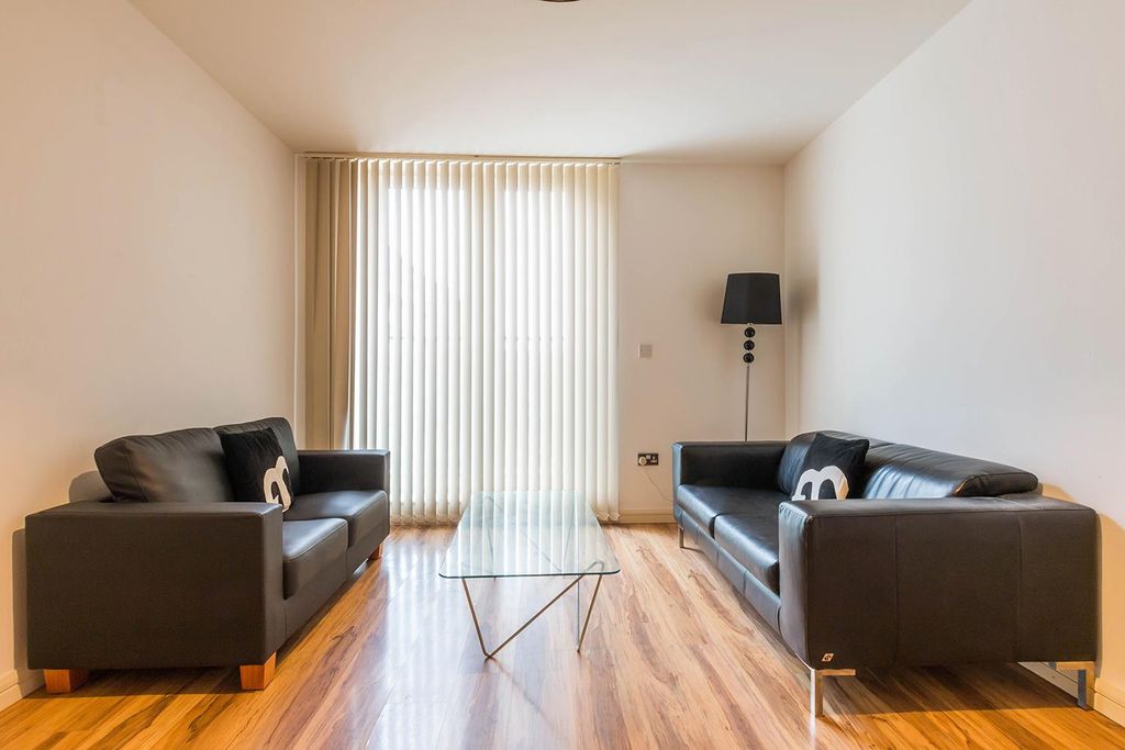 Property photo 2 of 9 Living Area