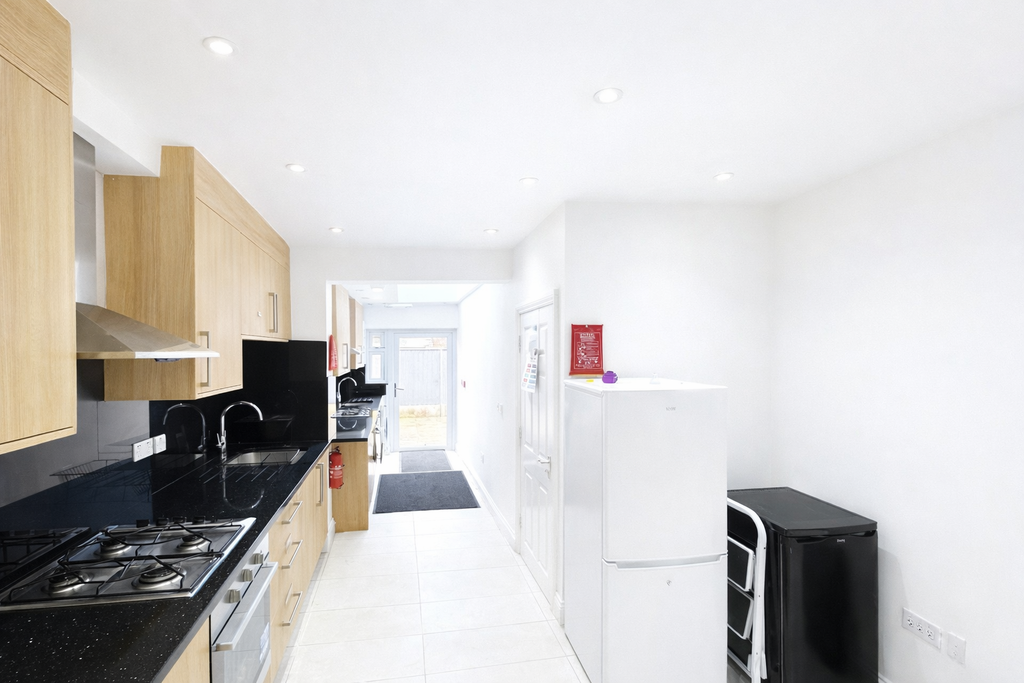 Property photo 3 of 10 Modern Kitchen With Natural Light