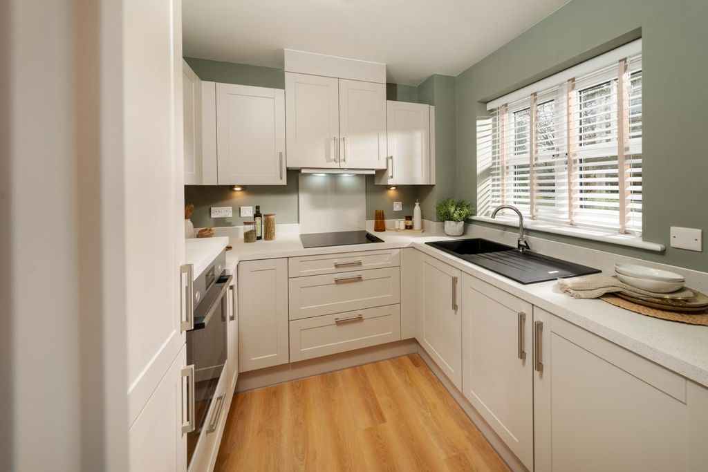 Property photo 2 of 8 Typical Kitchen