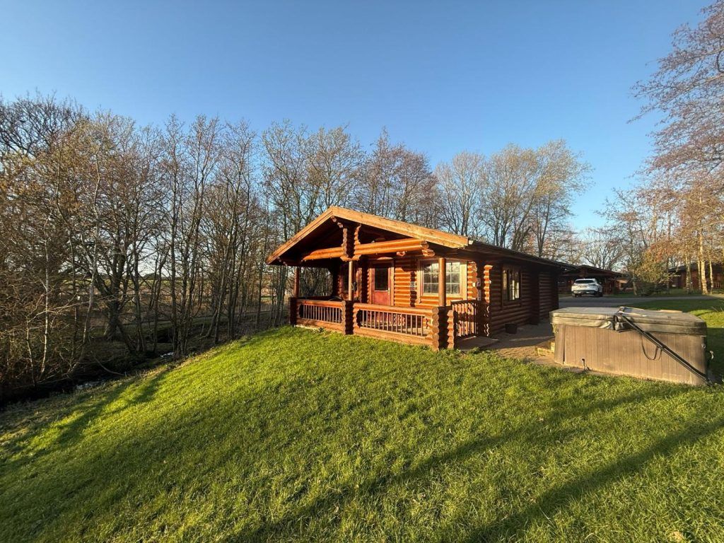 Property photo 1 of 7 Bespoke Log Cabin Exterior With Private Hot Tub And Driveway