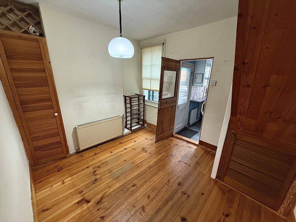 Property photo 3 of 9 Dining Room With Staircase And Window