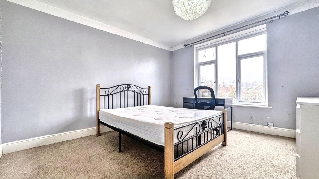 Property photo 3 of 13 Bright Master Bedroom With Desk And Large Window...