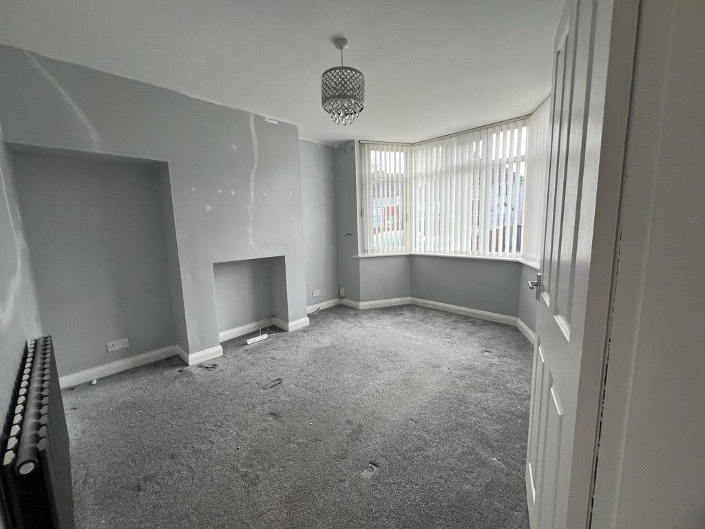Property photo 3 of 13 Front Living Room