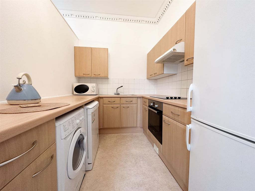 Property photo 3 of 7 Kitchen