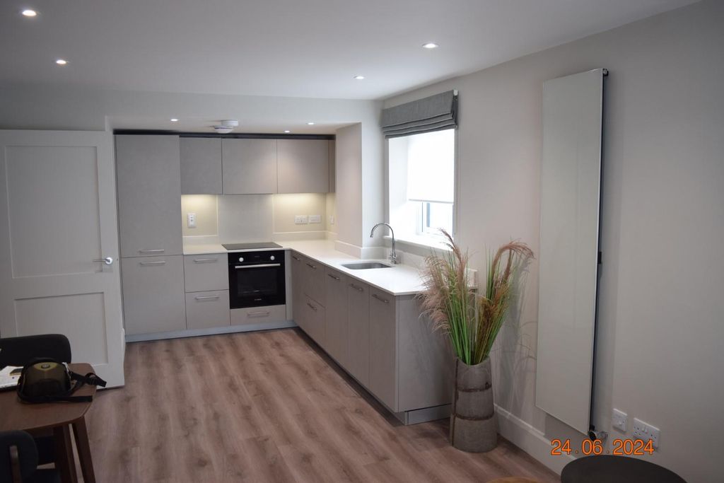 Property photo 3 of 21 Kitchen Area