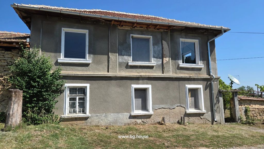 Property photo 3 of 80 Two-Storey House With Six Windows, Gray Walls, And A Metal Downspout On The Corner
