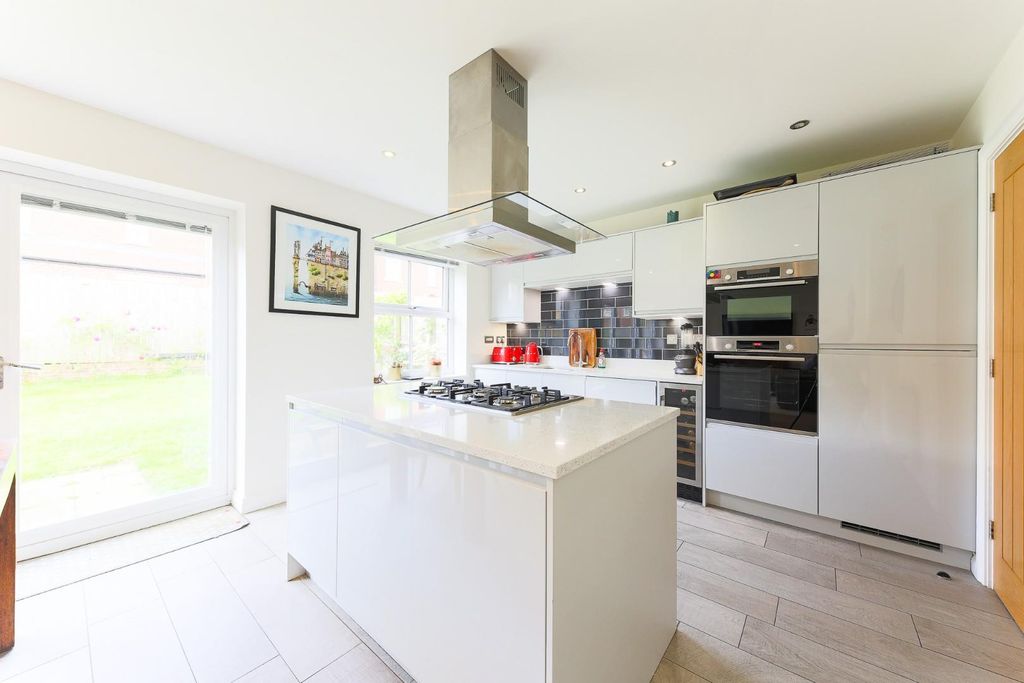 Property photo 3 of 18 Kitchen, Dining, Family Area