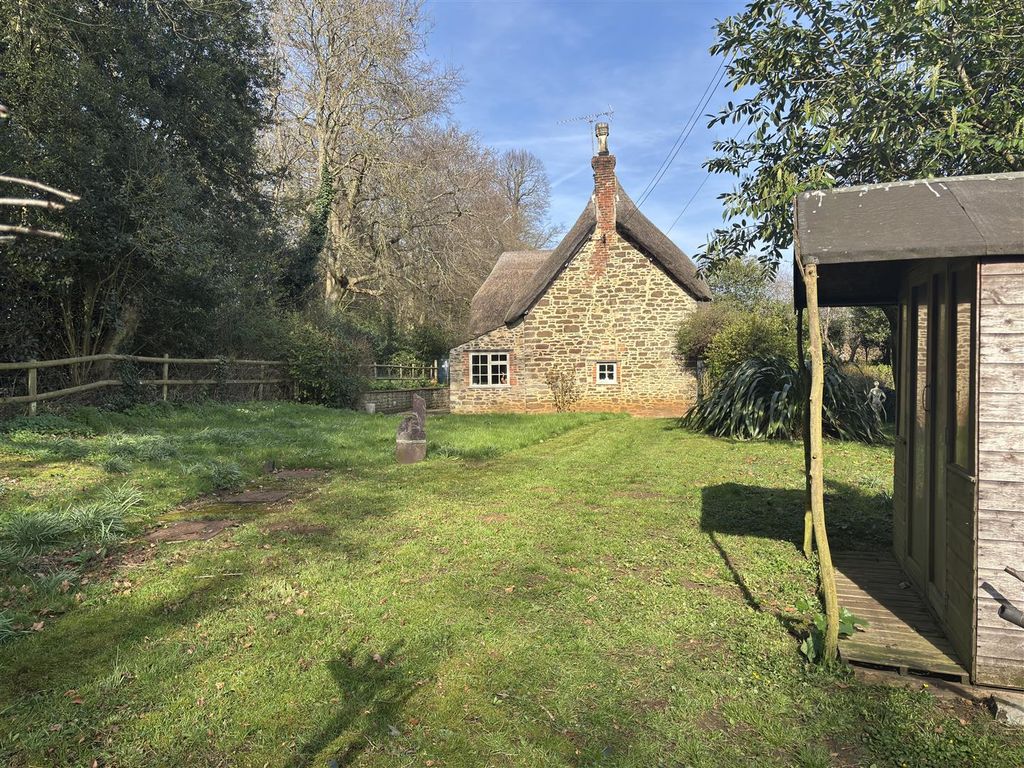 Property photo 1 of 32 Wans Cottage - Side Garden.Jpeg