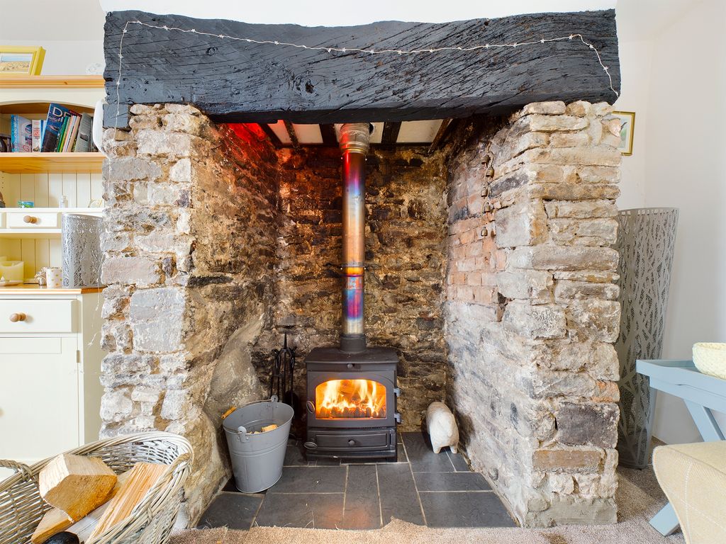 Property photo 1 of 10 Fireplace