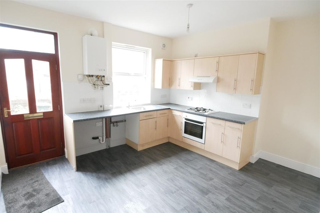 Property photo 3 of 8 Dining Kitchen