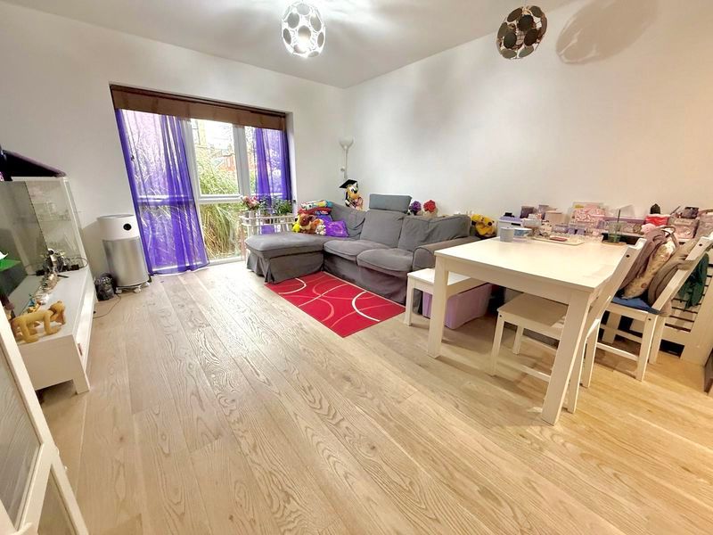 Property photo 2 of 8 Living Area