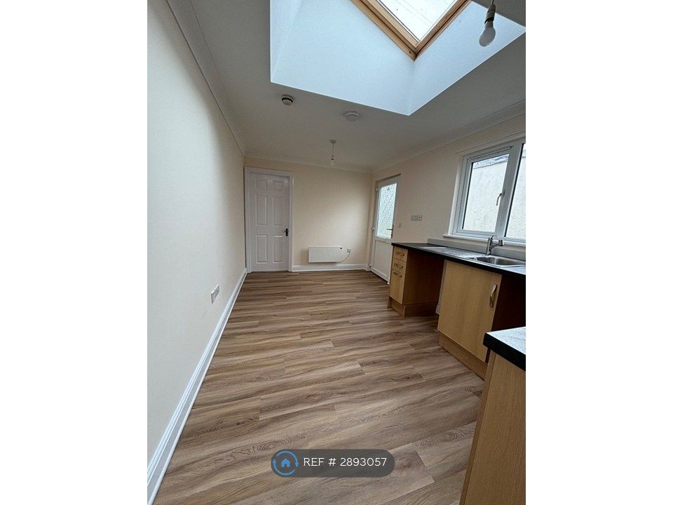 Property photo 2 of 6 Kitchen And Living Area
