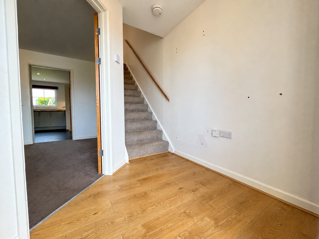 Property photo 2 of 18 Brightened Hallway With Clean Wooden Floor