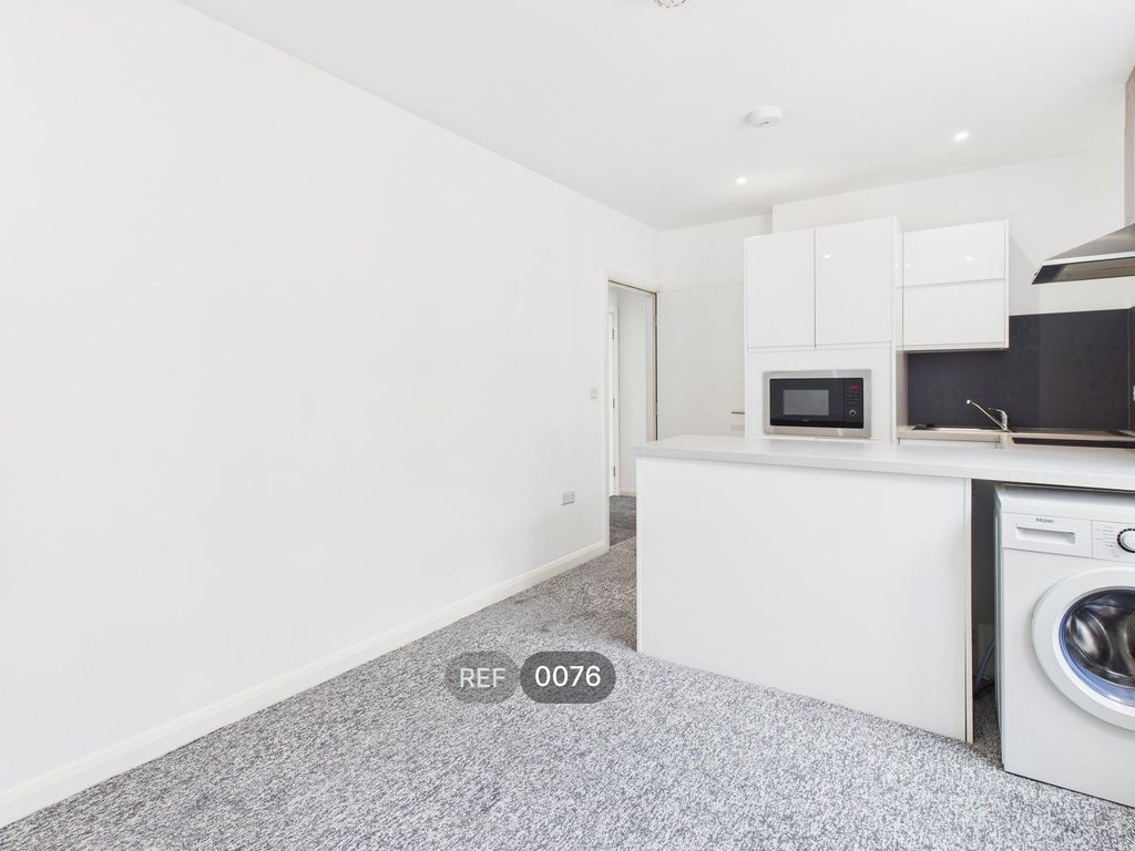 Property photo 3 of 21 Kitchen &amp; Living Area