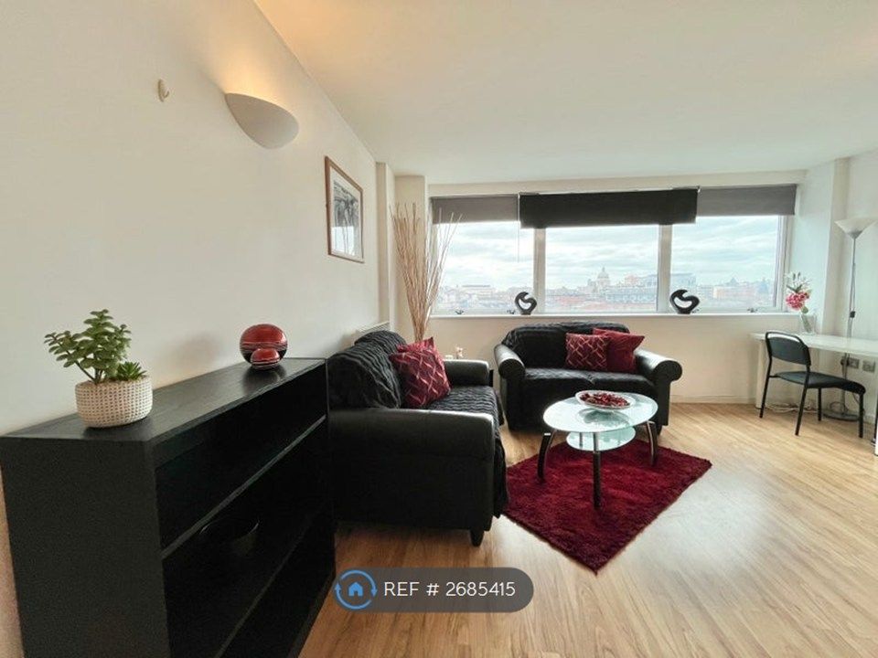 Property photo 3 of 12 Living Area