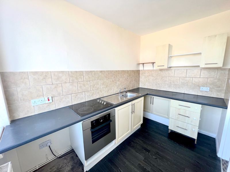 Property photo 2 of 8 Kitchen
