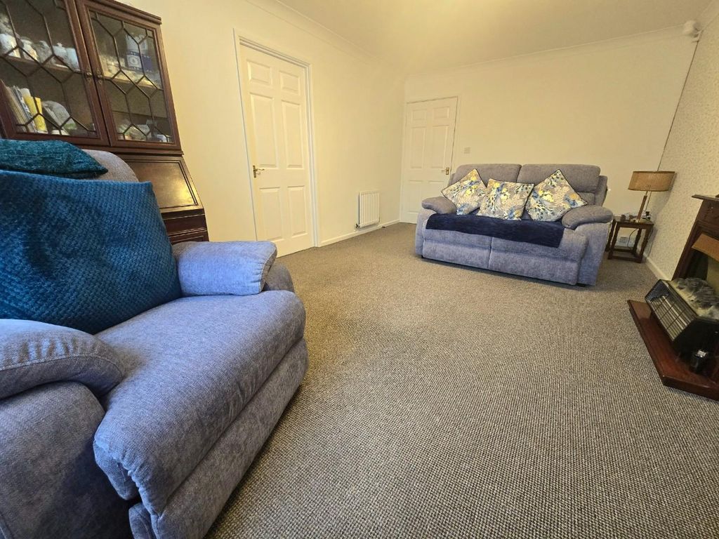 Property photo 3 of 11 Living Room 1.