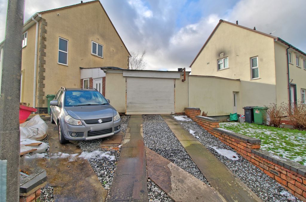 Property photo 2 of 19 Garage And Driveway