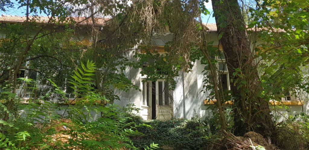 Property photo 1 of 53 Entrance Of The Old School Building Partially Hidden By Trees And Bushes
