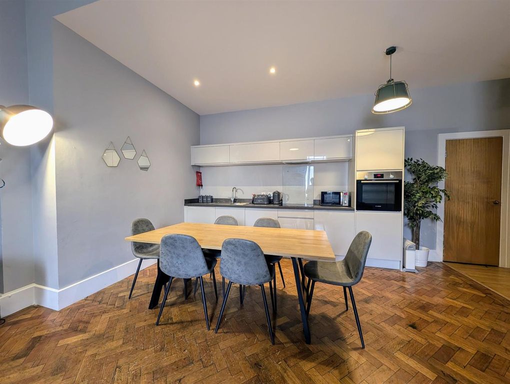 Property photo 3 of 8 Dining Area/Kitchen.Jpg
