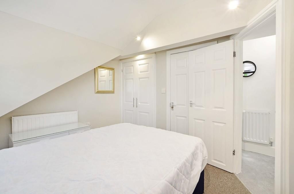 Property photo 2 of 15 Bright And Cozy Master Bedroom Featuring A Comfort...