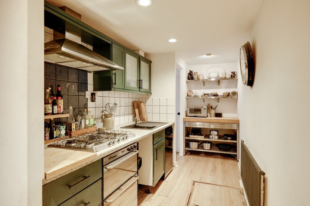 Property photo 3 of 13 Kitchen