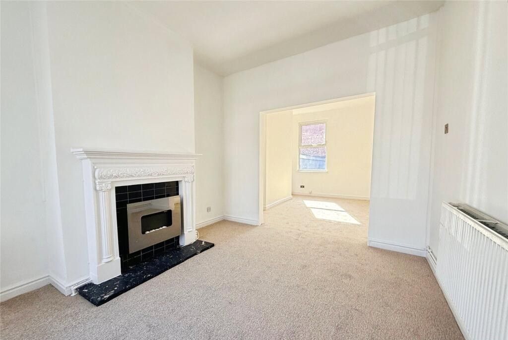 Property photo 3 of 18 Living Room 2