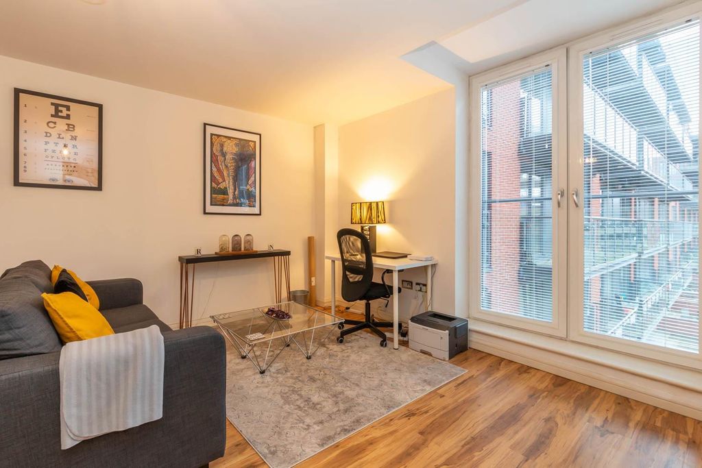 Property photo 2 of 8 Living Area