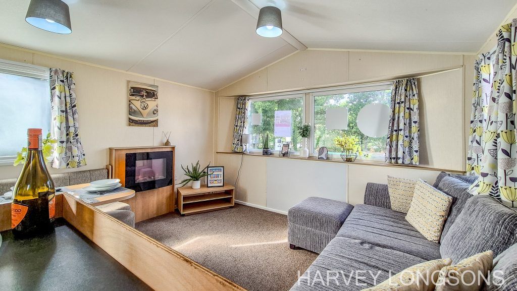 Property photo 3 of 18 Spacious Lounge With Large Windows And Sofa