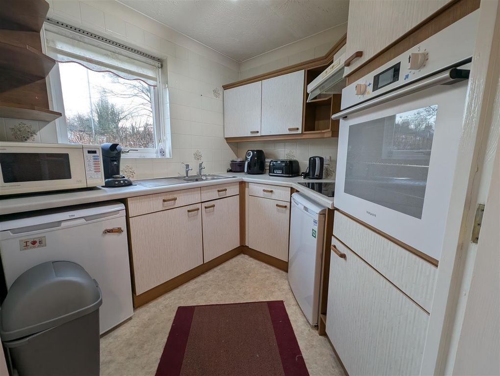 Property photo 3 of 12 Kitchen