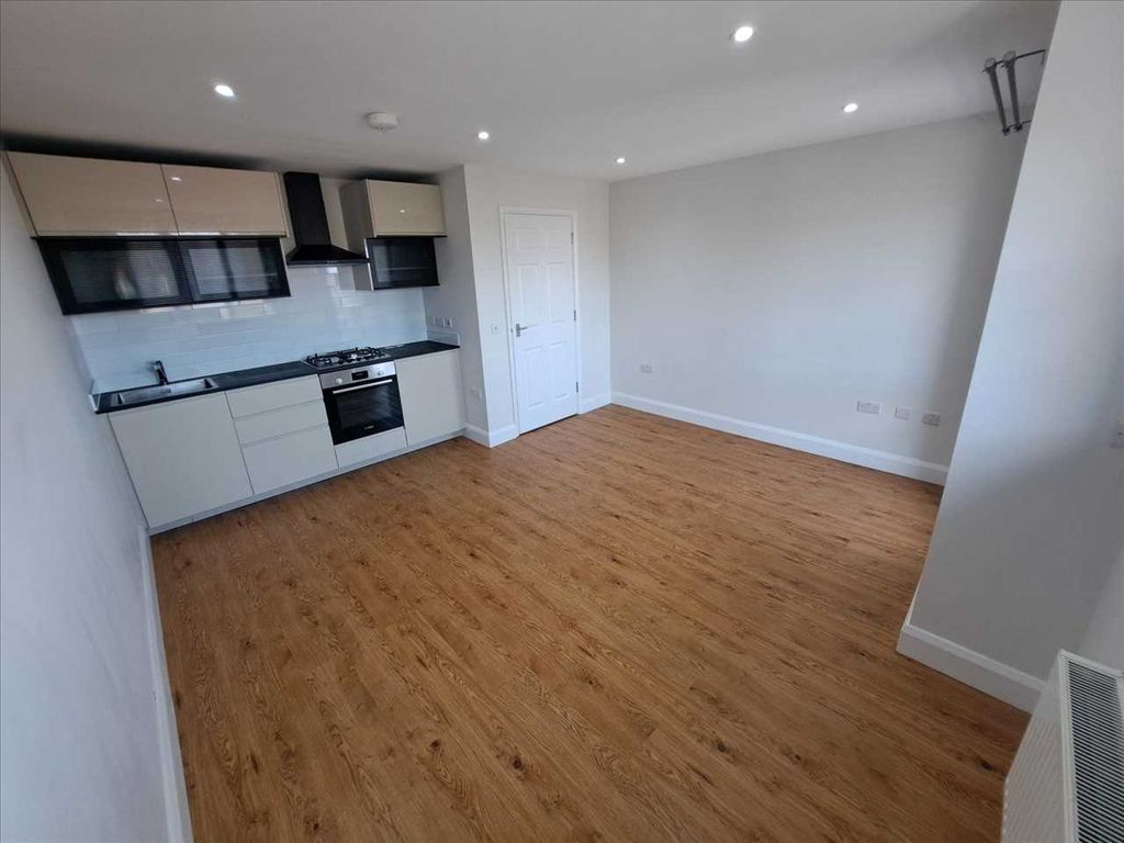 Property photo 3 of 10 Living Room With Kitchen