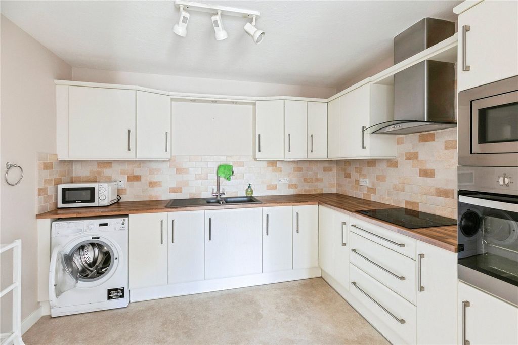 Property photo 3 of 12 Kitchen