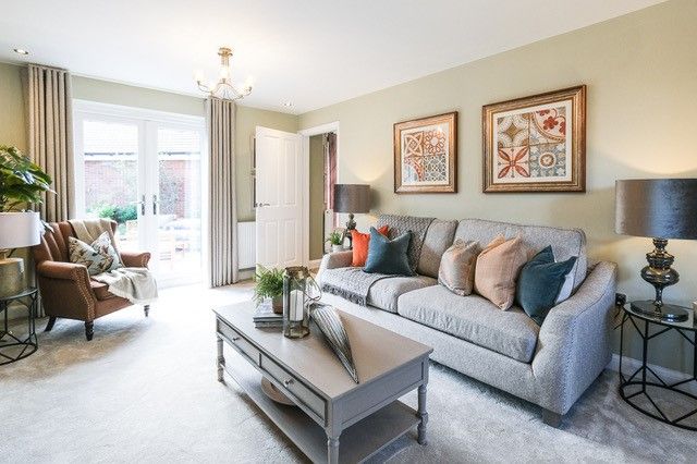 Property photo 2 of 10 Lounge With French Doors To A Garden