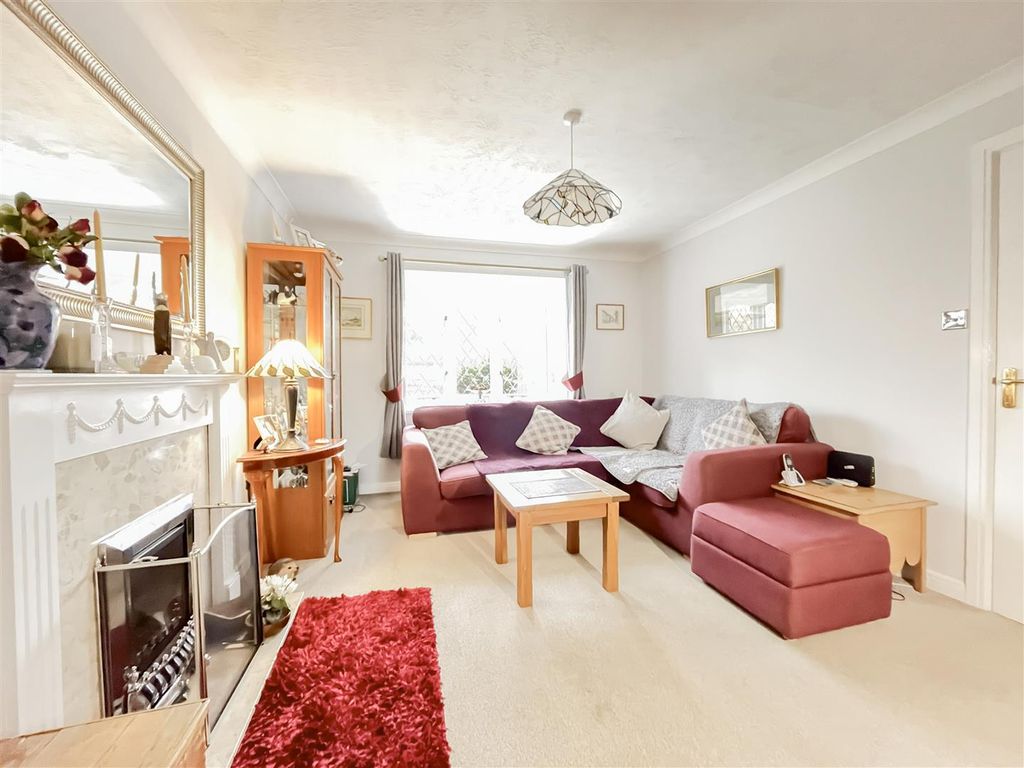 Property photo 3 of 22 12-Livingroom Bay 2.Jpg