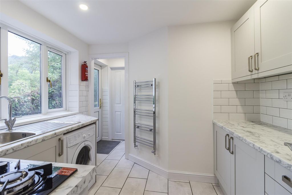 Property photo 1 of 9 Bright Modern Kitchen With Sleek Marble Counters...