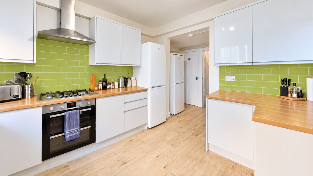 Property photo 1 of 16 Bright Modern Lime-Green Galley Kitchen