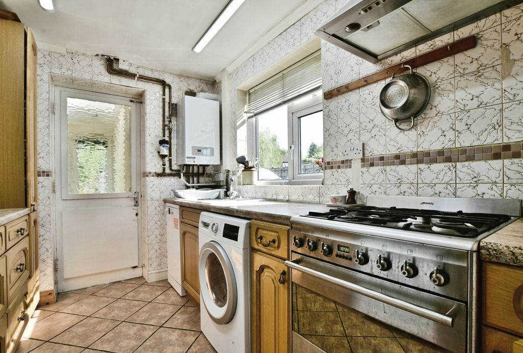 Property photo 2 of 12 Galley Kitchen