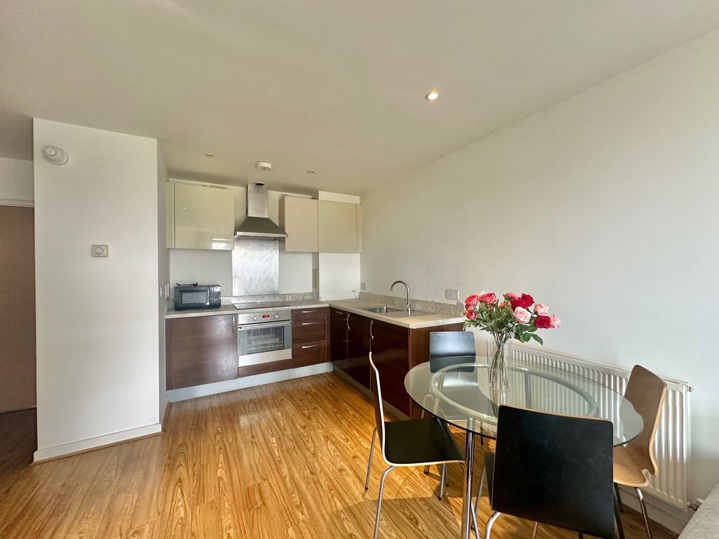 Property photo 3 of 6 Kitchen And Dining Space