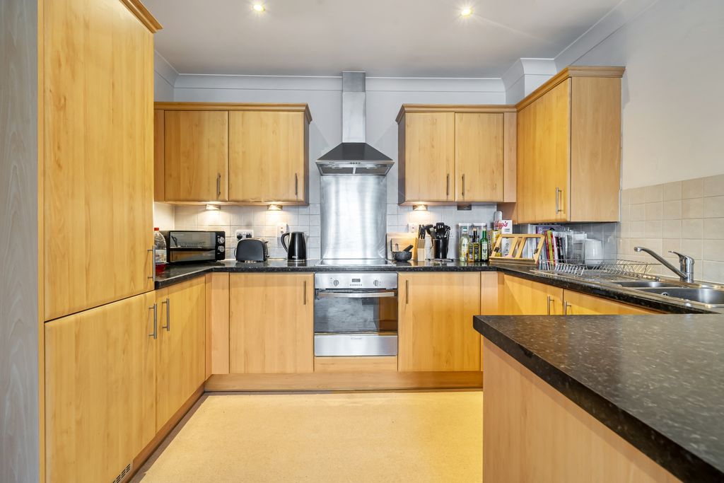 Property photo 3 of 14 Kitchen Area