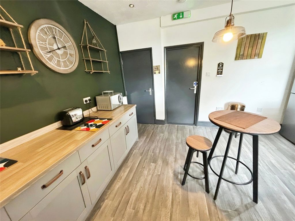 Property photo 3 of 6 Kitchen