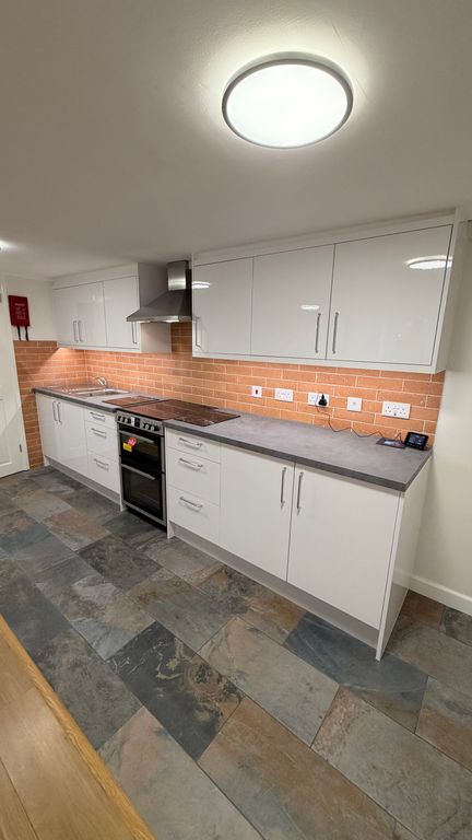 Property photo 3 of 8 Kitchen