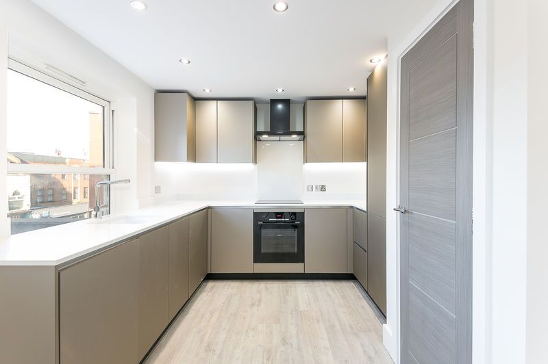 Property photo 1 of 8 Kitchen Area