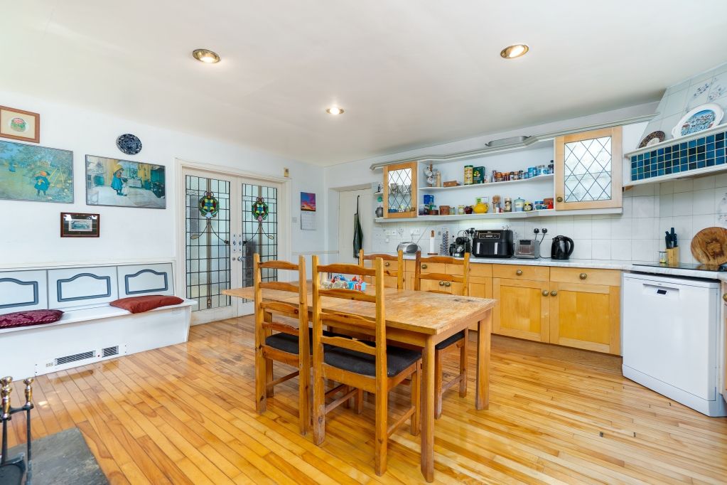 Property photo 3 of 28 Dining Kitchen