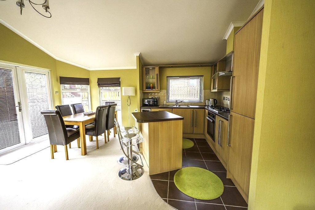 Property photo 3 of 11 Kitchen Area